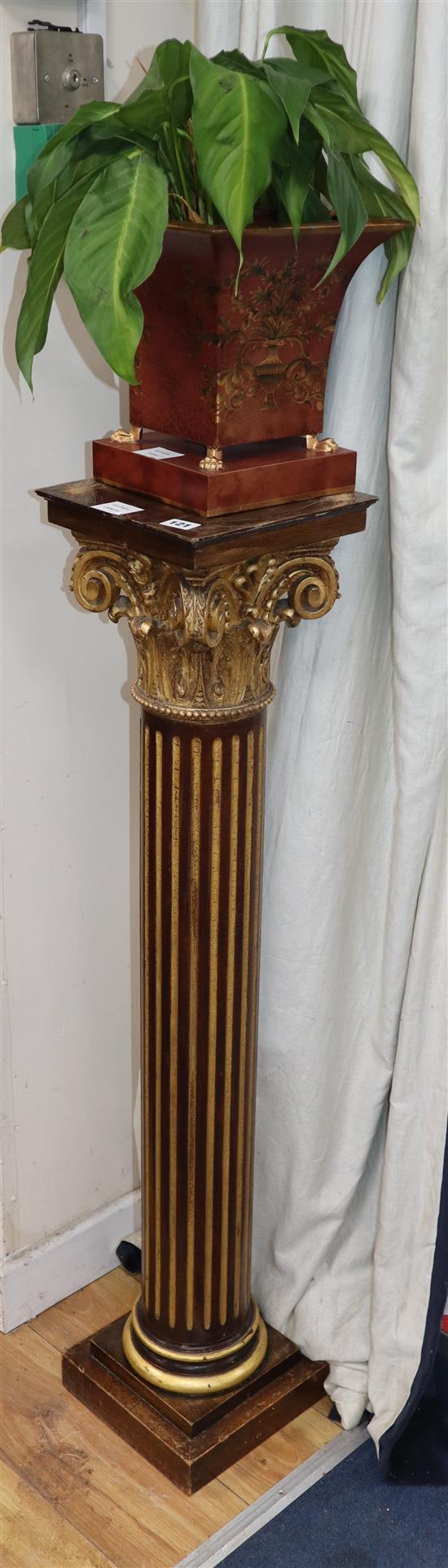 A carved giltwood Corinthian column pedestal, H.111cm, surmounted by a toleware planter